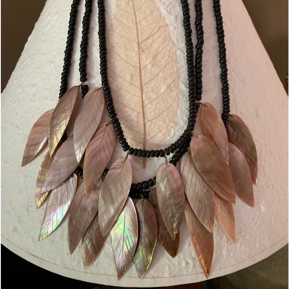 Vintage carved shell and black bead necklace.